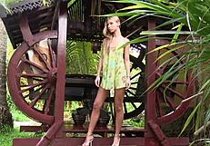 Blonde teen undressing in a short sun dress. Enjoying the bower's calm vibe.