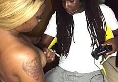 Ebony babe gives head while gaming