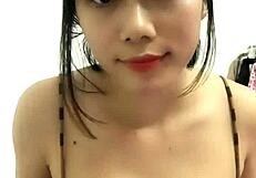 em ngoc nguyen shows off her big tits