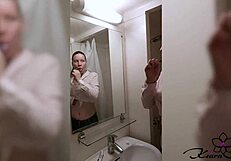 Blonde enjoys a relaxing shower bath as an amateur