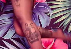 teasing in ripped pantyhose and latex dress