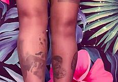 teasing in ripped pantyhose and latex dress