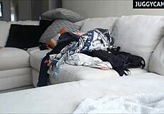 this redhead babe with huge natural tits is on webcam showing off her boobs and teasing the camera in a casual way