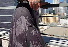 Two Amateur Girls Get Soaking Wet On Balcony