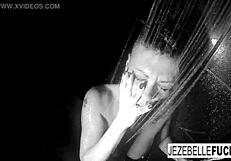 Sultry curvy brunette Jezebelle shows off huge b00bs while Showering