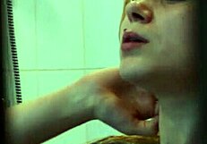 I love watching my skinny blonde girl bathing in the shower, her body so enticing under the water.