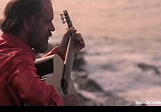 Kristi Somers Teases with Sexy Topless Scenes in Hardbodies 1984