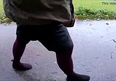 Stockings Worn Outdoors In Public Setting For Detailed View