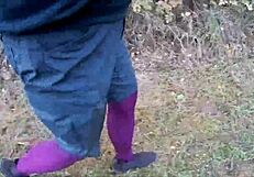 Stockings Worn Outdoors In Public Setting For Detailed View