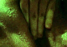 i am touching myself in a suggestive way, reaching orgasm