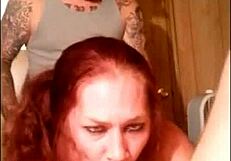 Redhead milf amateur participates in threesome