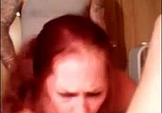 Redhead milf amateur participates in threesome