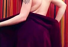 Beautiful redhead masturbates in the shower, fingering her wet pussy.