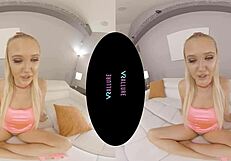 Stunning blonde stuns in her lingerie while playing with toys