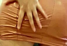 Femdom in latex beige dress gives jerk off instructions with dirty talk.