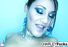 Charley strips and spreads her sexy body!