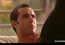 Michelle Maylene sitting in a softcore pose