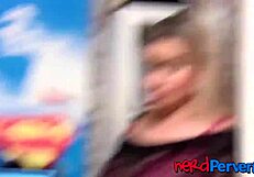 Busty curvy woman with round rear end giving blowjob