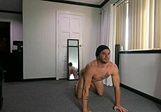 Wednesday stretches naked in casual routine