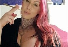 sensual tattooed babe with big natural tits smokes and teases in webcam fetish