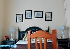 Latina BBW with big tits rides a huge dildo passionately.