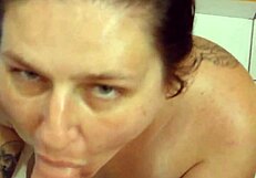 this horny slut begs for cum in her mouth while sucking and getting a handjob on her boobs