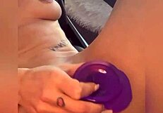Closeup babe squirting from purple dildo?