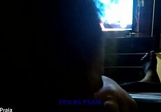 Watching reality show while getting blowjob from big black cock in the dark!