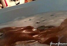 Blonde teen gives footjob in home video