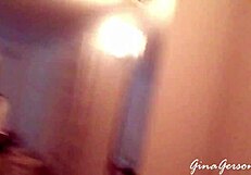 Blonde teen gives footjob in home video