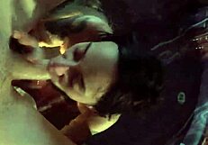 She sucks her man in the steamy jacuzzi, big tits bouncing.