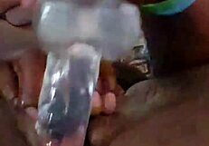 Ebony self pleases her ass