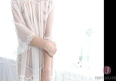 Asian Babe Seduces with Nipple-Skimming Naughty Outfit!