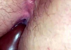 Wife uses big black toy on husband for creampie push