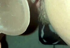 Wife uses big black toy on husband for creampie push