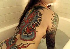 Wow, check out this tattooed bath show finale!
