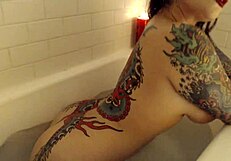 Wow, check out this tattooed bath show finale!