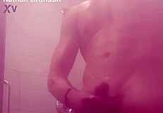 Muscular man flaunts his muscles and self gratifies in the shower