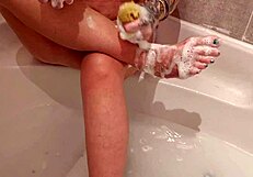 A MILF masturbates on her feet again
