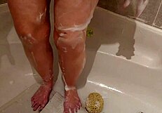 A MILF masturbates on her feet again