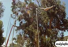 lovely badass babes, blonde and brunette, enjoyed swinging naked outdoors in this reality scene.