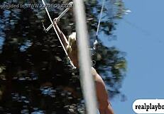 lovely badass babes, blonde and brunette, enjoyed swinging naked outdoors in this reality scene.