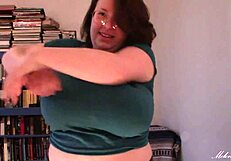 See girl with white skin, real boobs removing the blue T-shirt