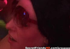 horny lady enjoys a wild gangbang where guys cum all over her face in a bukkake session