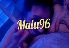 A young woman engages in oral activities with telo.