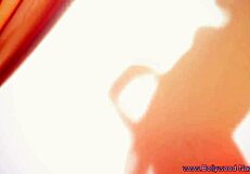 WATCH THIS BRUNETTE MILF RIP HER CLOTHES OFF IN A SEDUCTIVE STRIPTEASE DANCE!