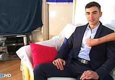 Horny Salesman Feels Huge Cock Wanked in Suit