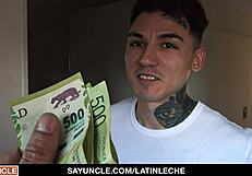 Muscular tattooed Latino stud fucking a large cocked man in a self-made gay scene