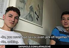 Muscular tattooed Latino stud fucking a large cocked man in a self-made gay scene