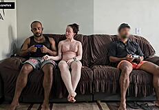 Husband's Nerd Plays Video Game While Wife Rides Friend's Cock